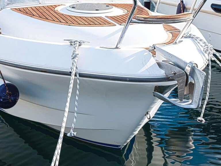 Boat tied to dock