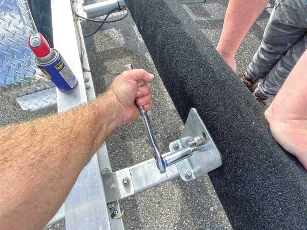 Loosening bolts on a trailer