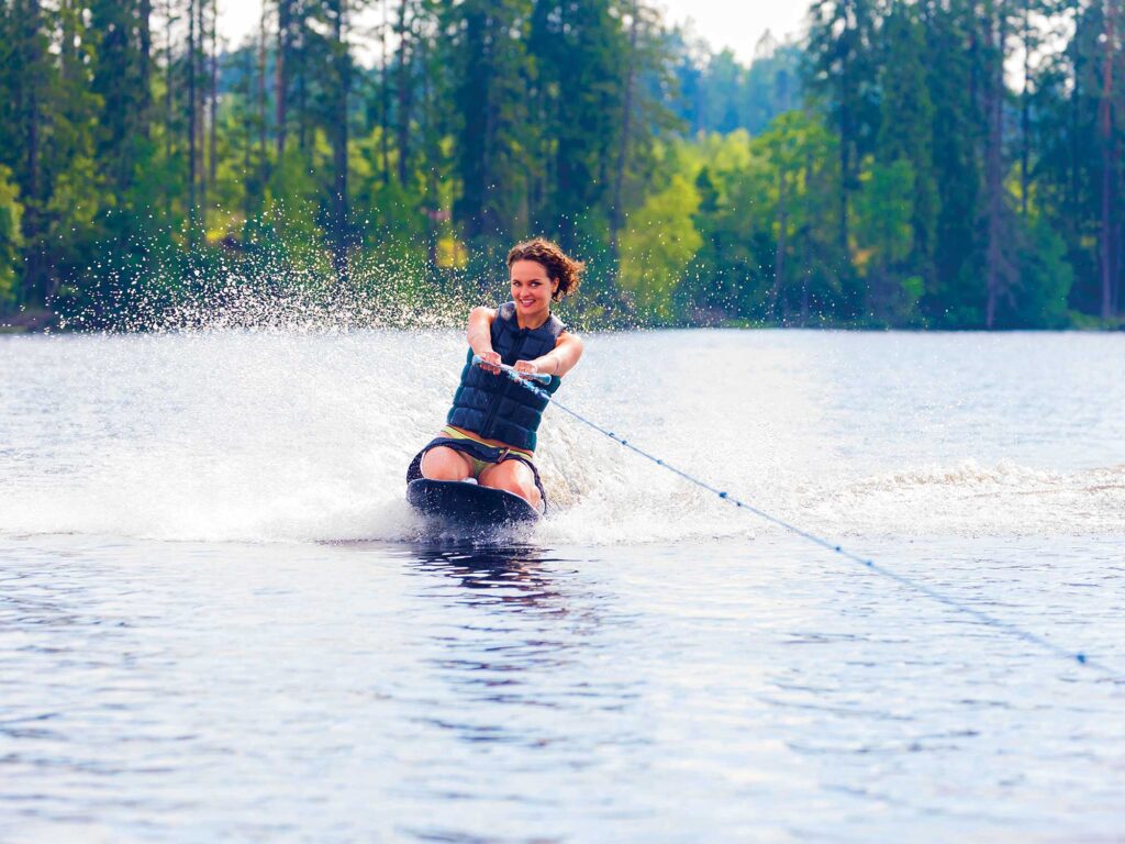 Kneeboarding behind the boat