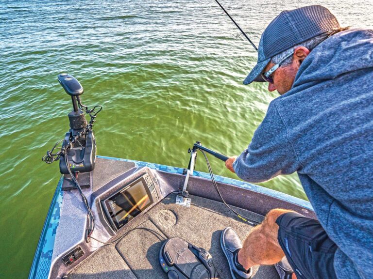 Humminbird Mega Live Hand Control being used by a fisherman