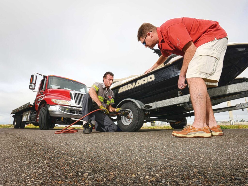 Technician checking out trailer