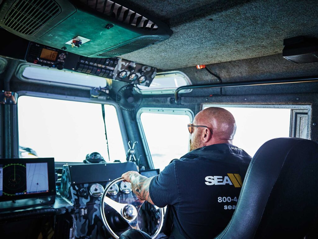 Sea Tow captain checking navigation screens