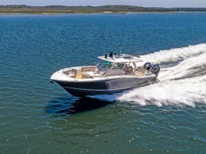 Scout 400 LXF running near shore