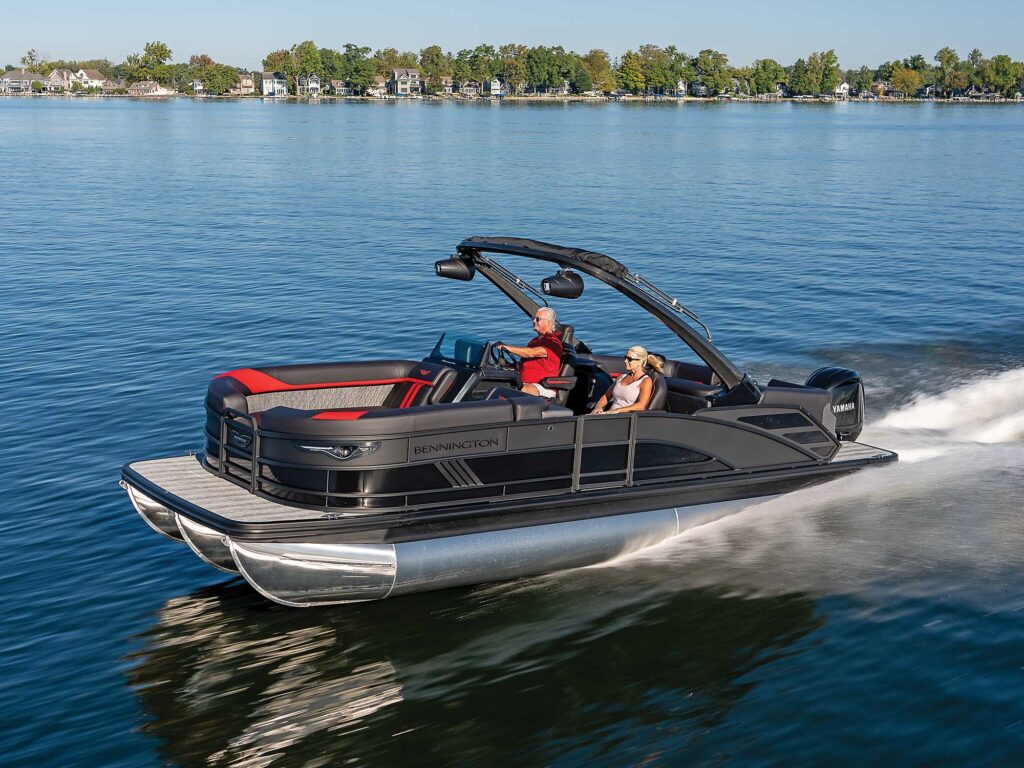 Bennington 24 MFB Sport on a lake