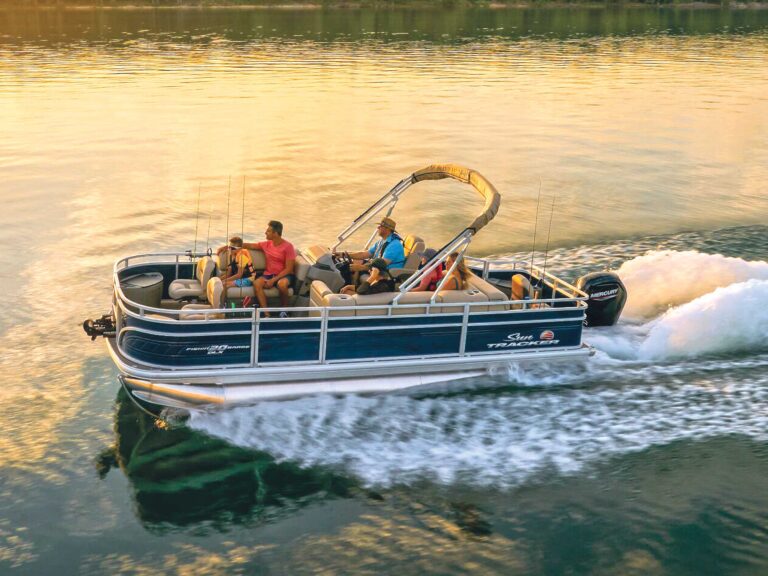 Sun Tracker Party Barge 20 DLX at sunset