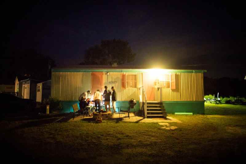 Jamming and cooking by moonlight around the fire