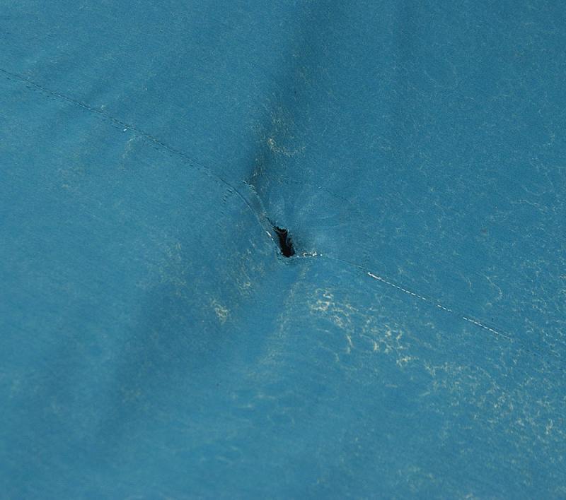 Patching a hole in canvas