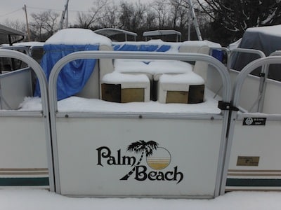 Snow Covered Pontoon Boat