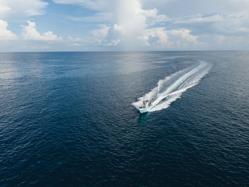 Boat running in the open ocean