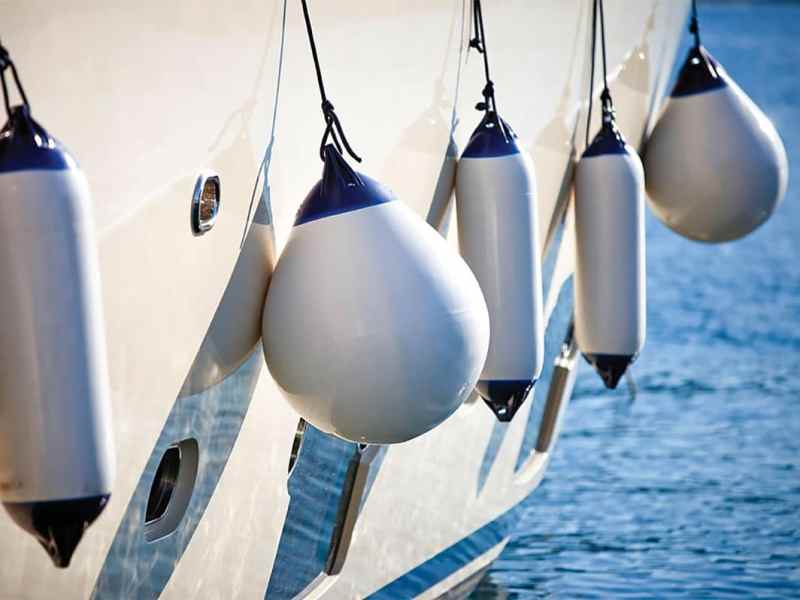BTG1223-Fenders-WSF Boat with fenders hanging