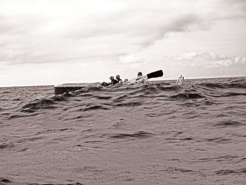 Pontoon boat in lake swells
