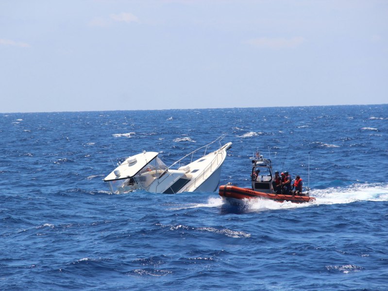 Boat sinking in the ocean