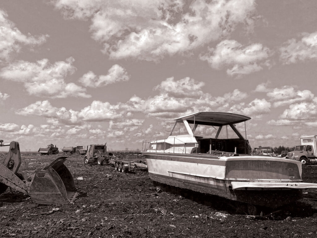 Derelict boat in a field