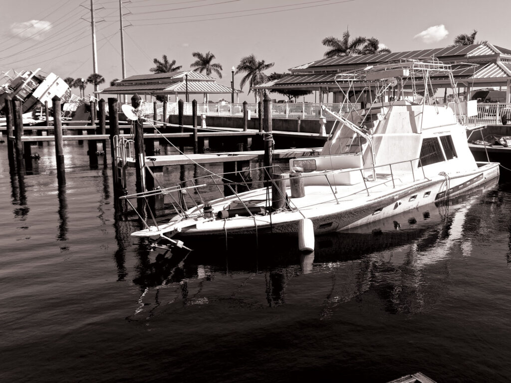 Damaged boat sunk in its slip