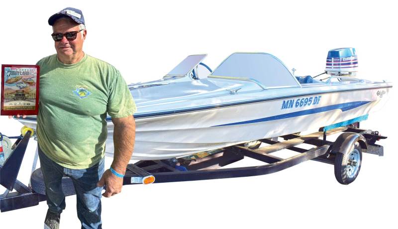 John Tiger with his award-winning boat