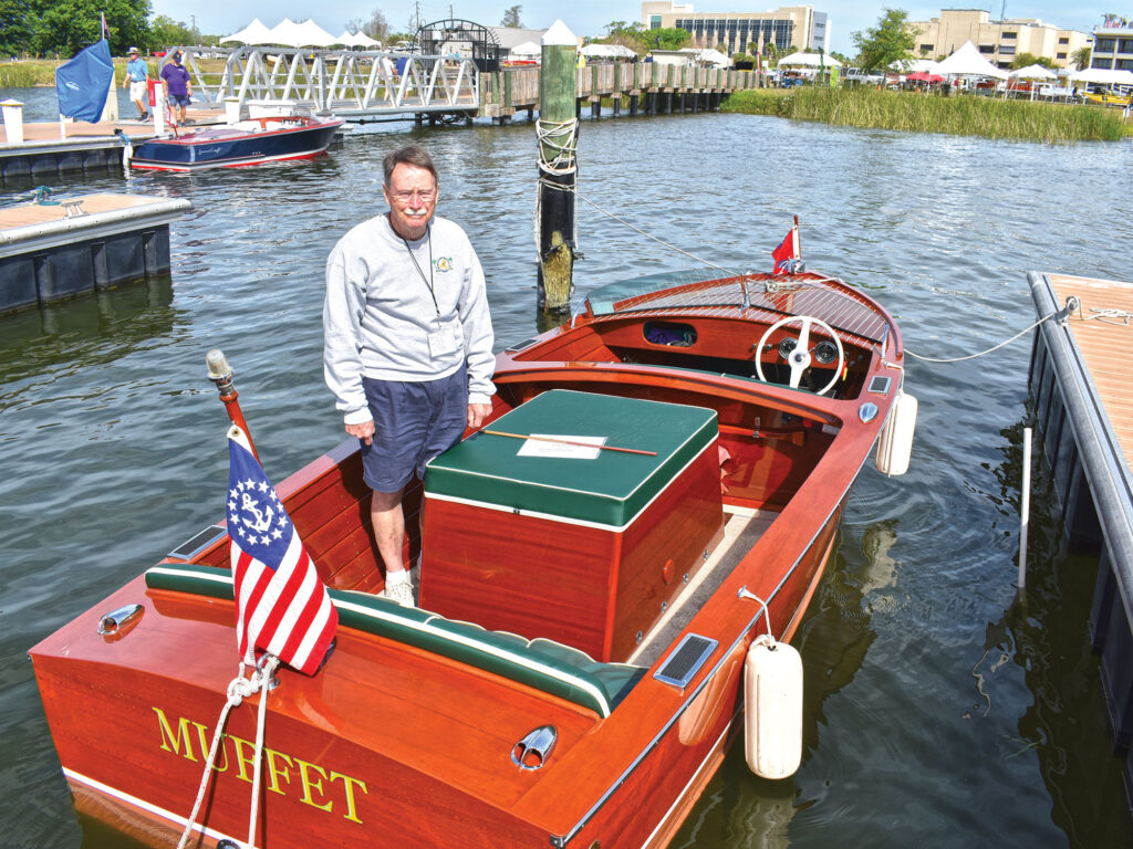 George Emmanuel aboard his Chris-Craft