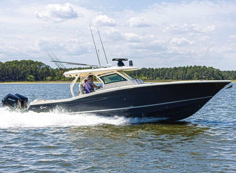 Scout boat running in the river