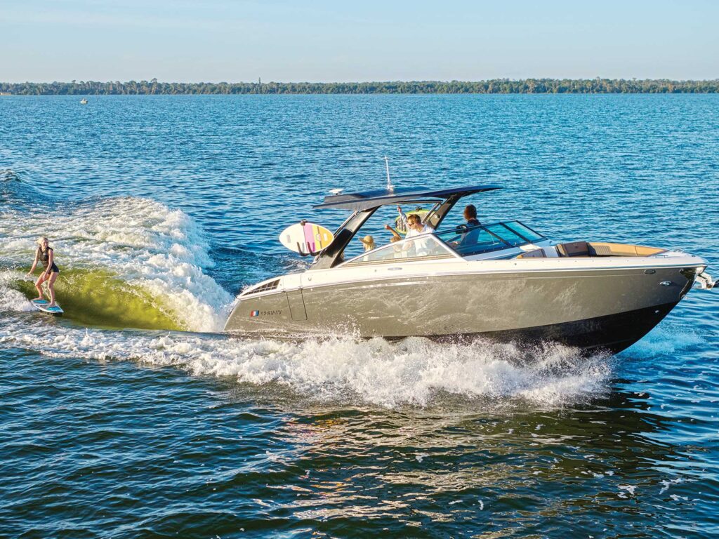 Cobalt R33 Surf surfing on the lake