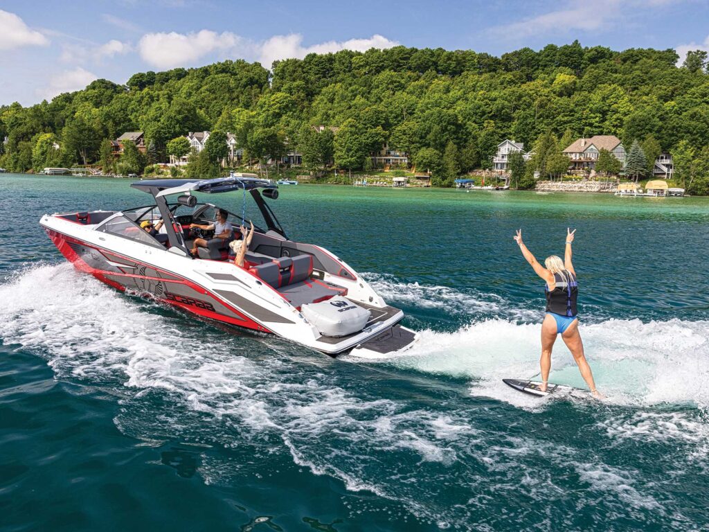 Scarab 285 LX Wake wakesurfing on a lake