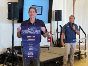David Reed presenting award to Mustang Survival