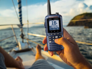 Boater holding up Standard Horizon VHF