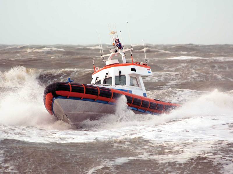 Boat out in rough seas