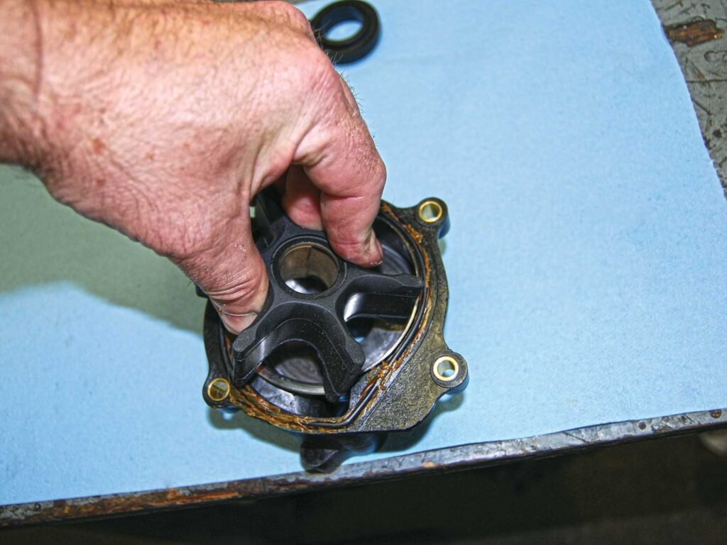 Pushing impeller into water-pump housing
