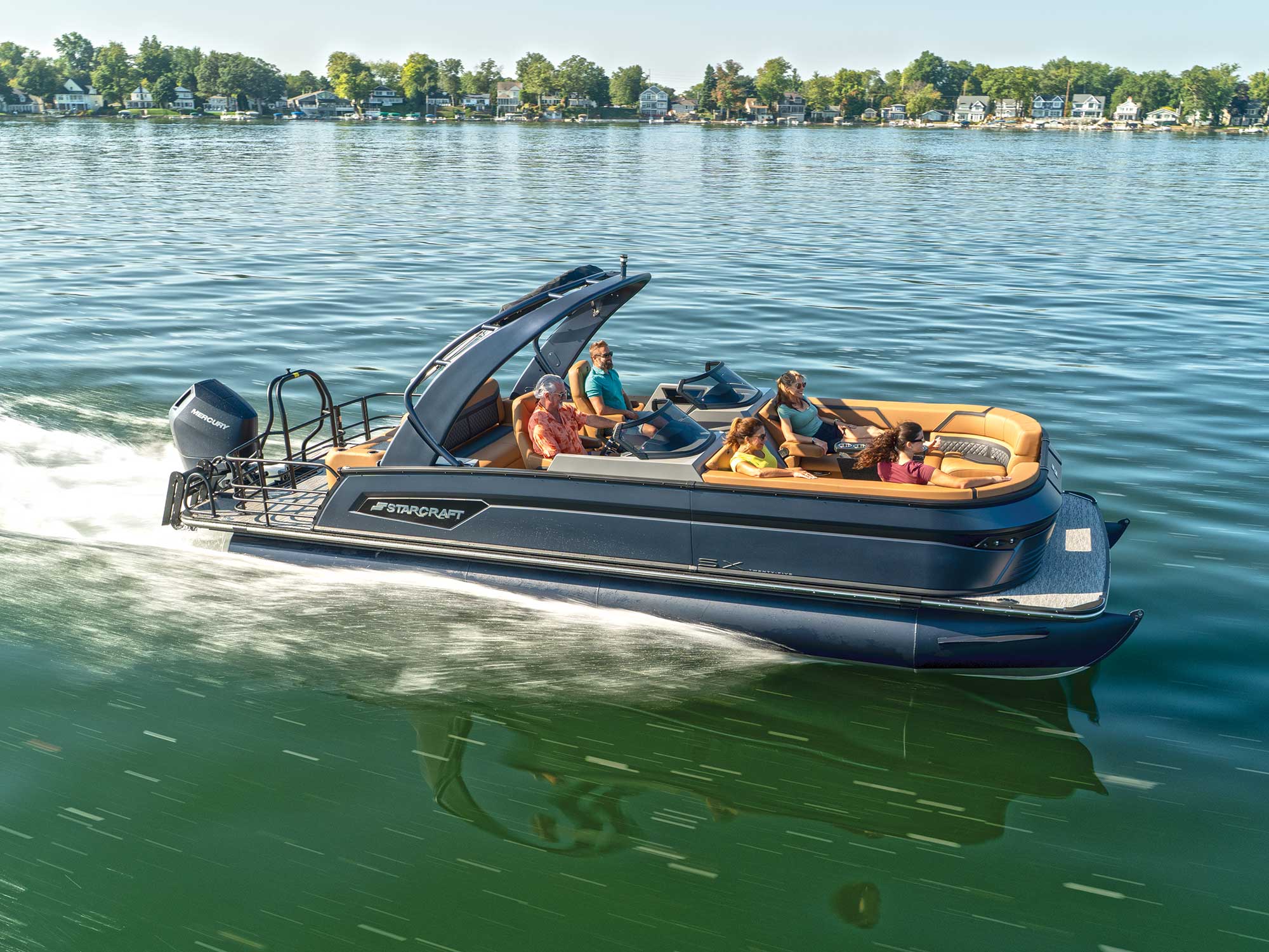 Starcraft SX 25 Q DC cruising over chop