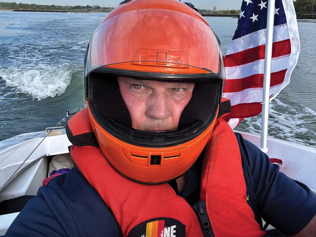 Tim Sharkey running his boat