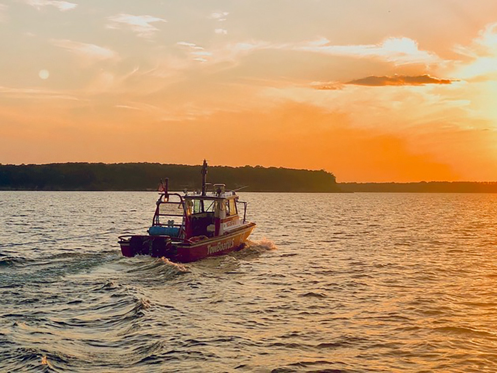 Towboat on Lake Texoma at sunset
