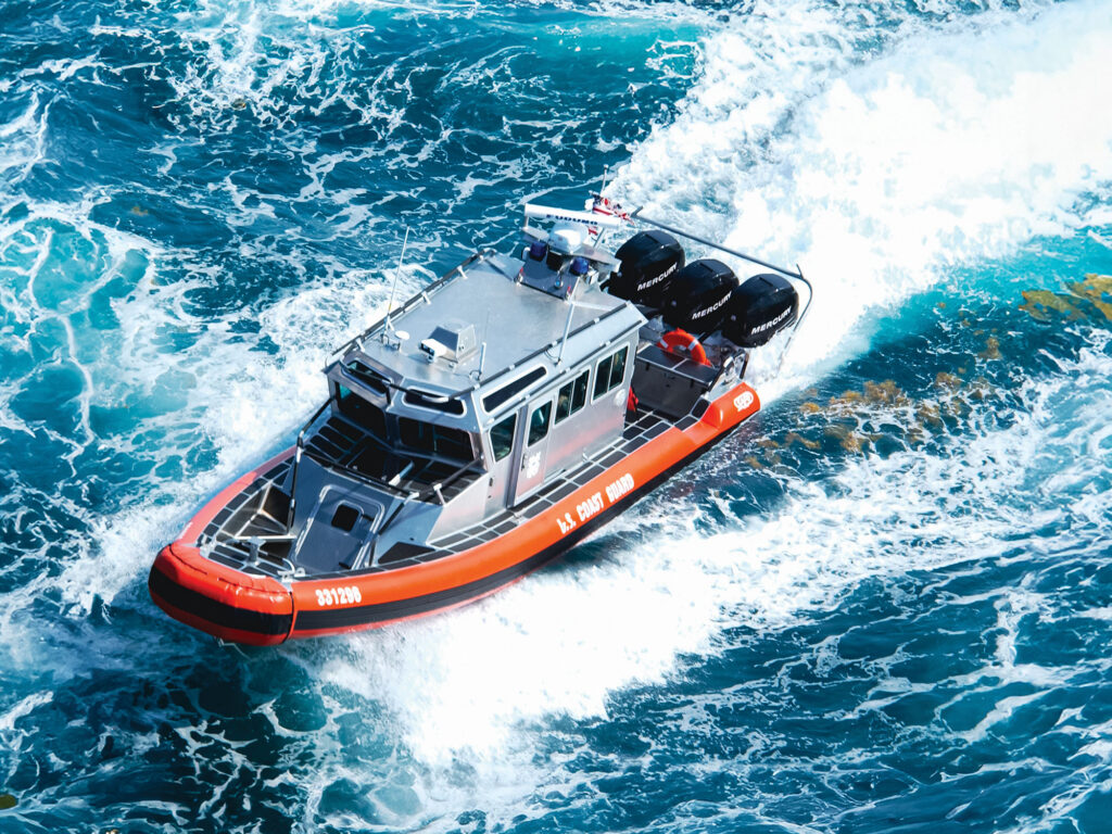 33-foot Special Purpose Craft—Law Enforcement boat running near shore