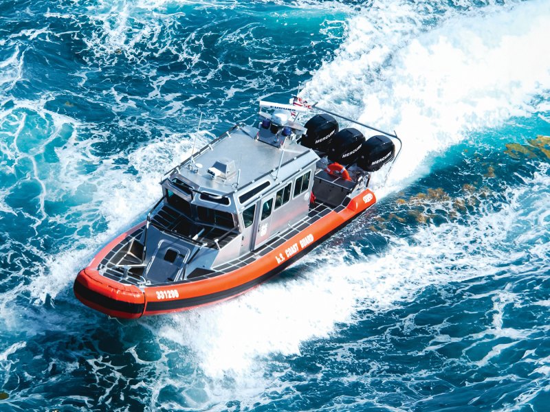 33-foot Special Purpose Craft—Law Enforcement boat running near shore