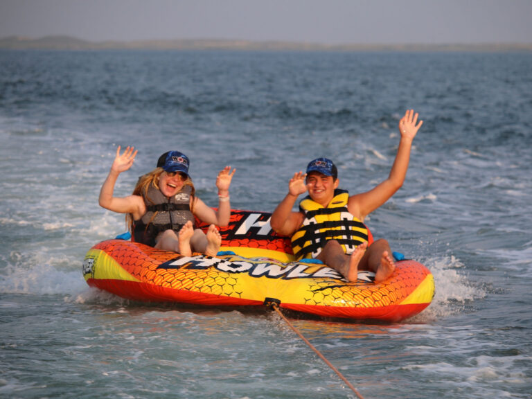 Tubers wearing life jackets