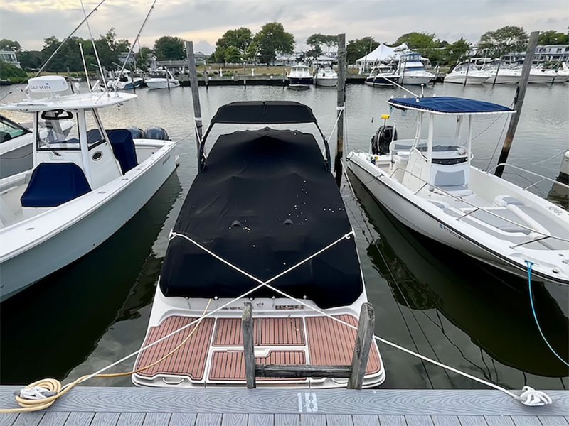 Boat rigged with crossed lines