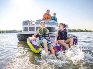 BTG826-Level-50-opener-for-BTG Level 50 life jackets worn by boating family