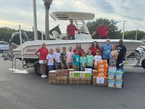 Boston Whaler donating school supplies