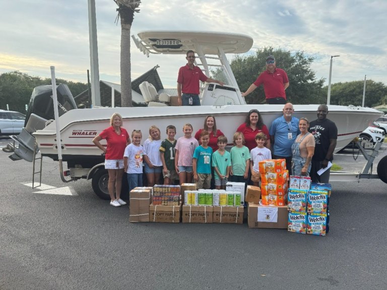 Boston Whaler donating school supplies