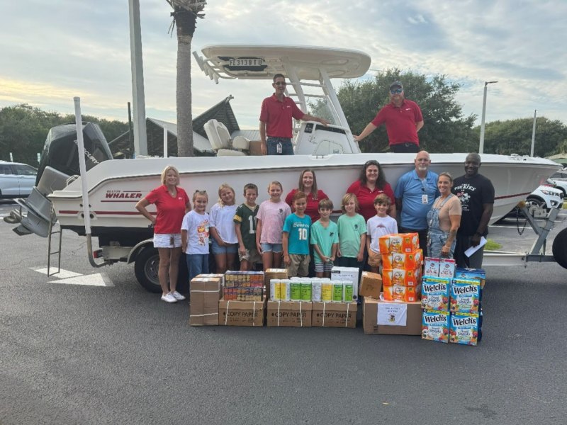 Boston Whaler donating school supplies