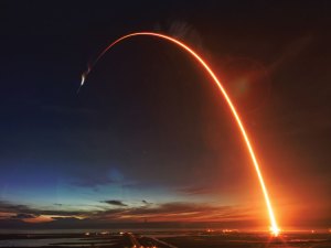 Rocket taking off with satellites