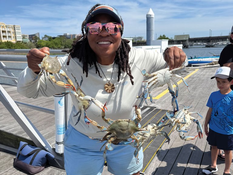 BTG1026-OBW-Tia-Clark Tia Clark taking people crabbing